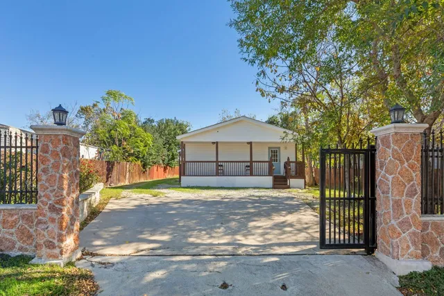 a house view with a garden space