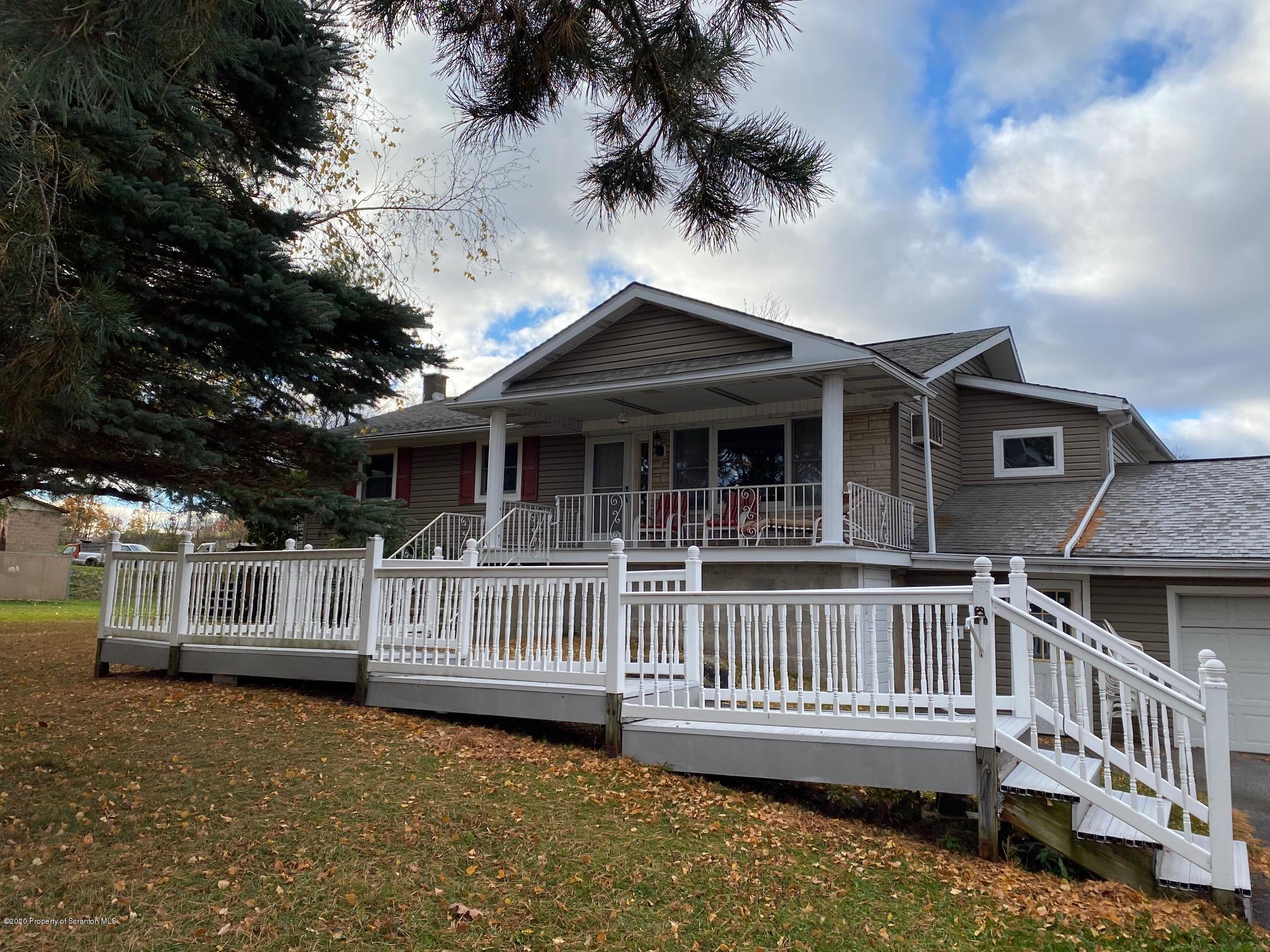 a view of a house with a deck