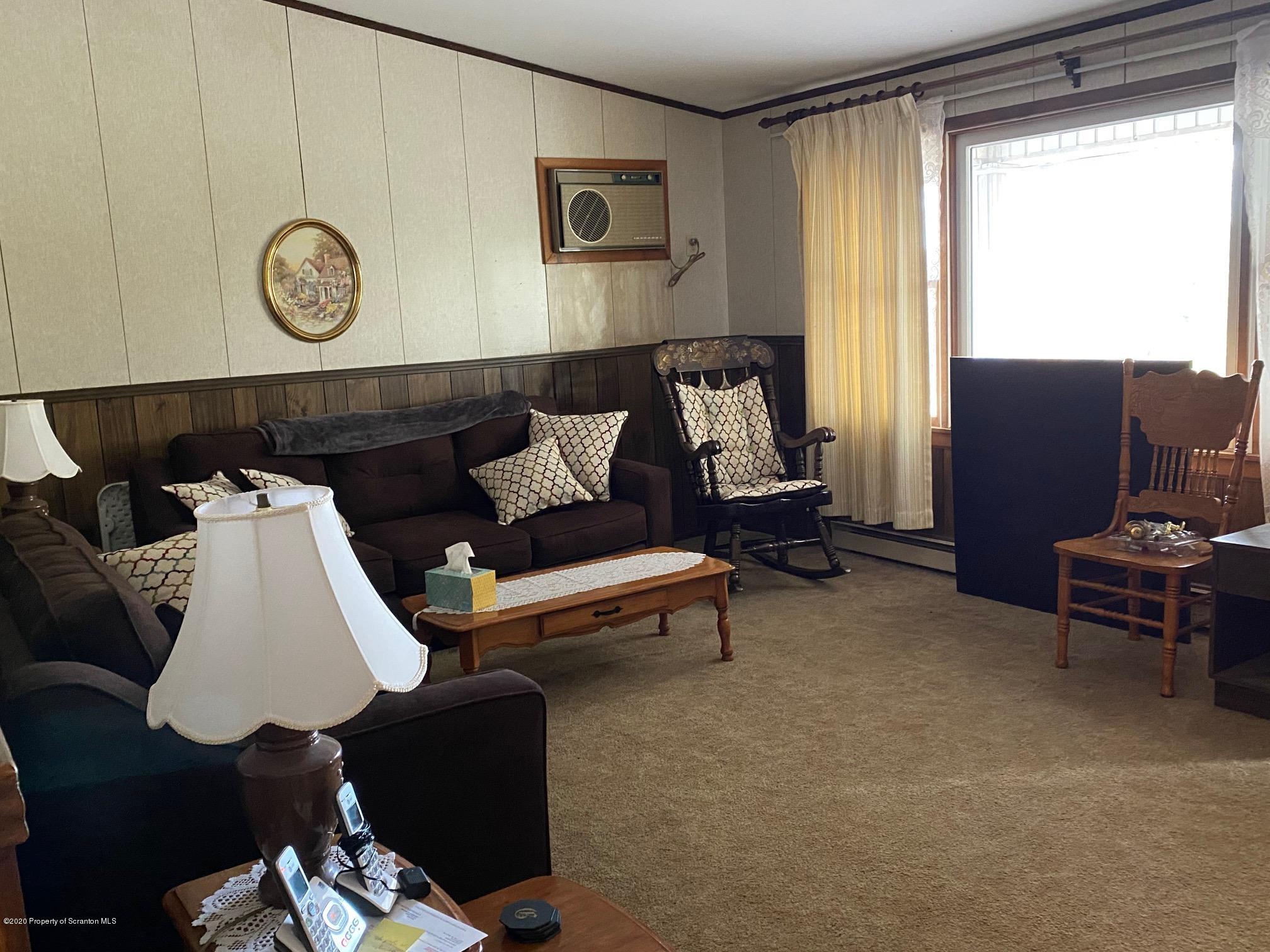 25 Dennis Road Scott Township, PA 18447 - Photo 14 of 43 a living room with furniture and a large window