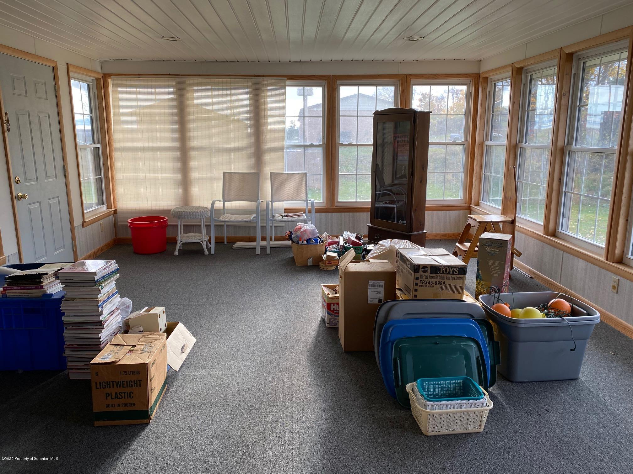 25 Dennis Road Scott Township, PA 18447 - Photo 23 of 43 a room with furniture and a large window