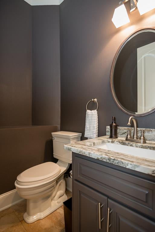 4248 Crowder Road Franklin, TN 37064 - Photo 11 of 29 a bathroom with a granite countertop toilet sink and mirror