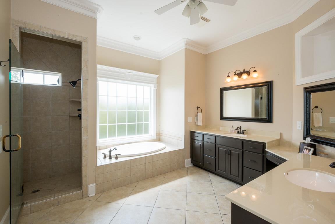 4248 Crowder Road Franklin, TN 37064 - Photo 15 of 29 a spacious bathroom with a tub sink and mirror