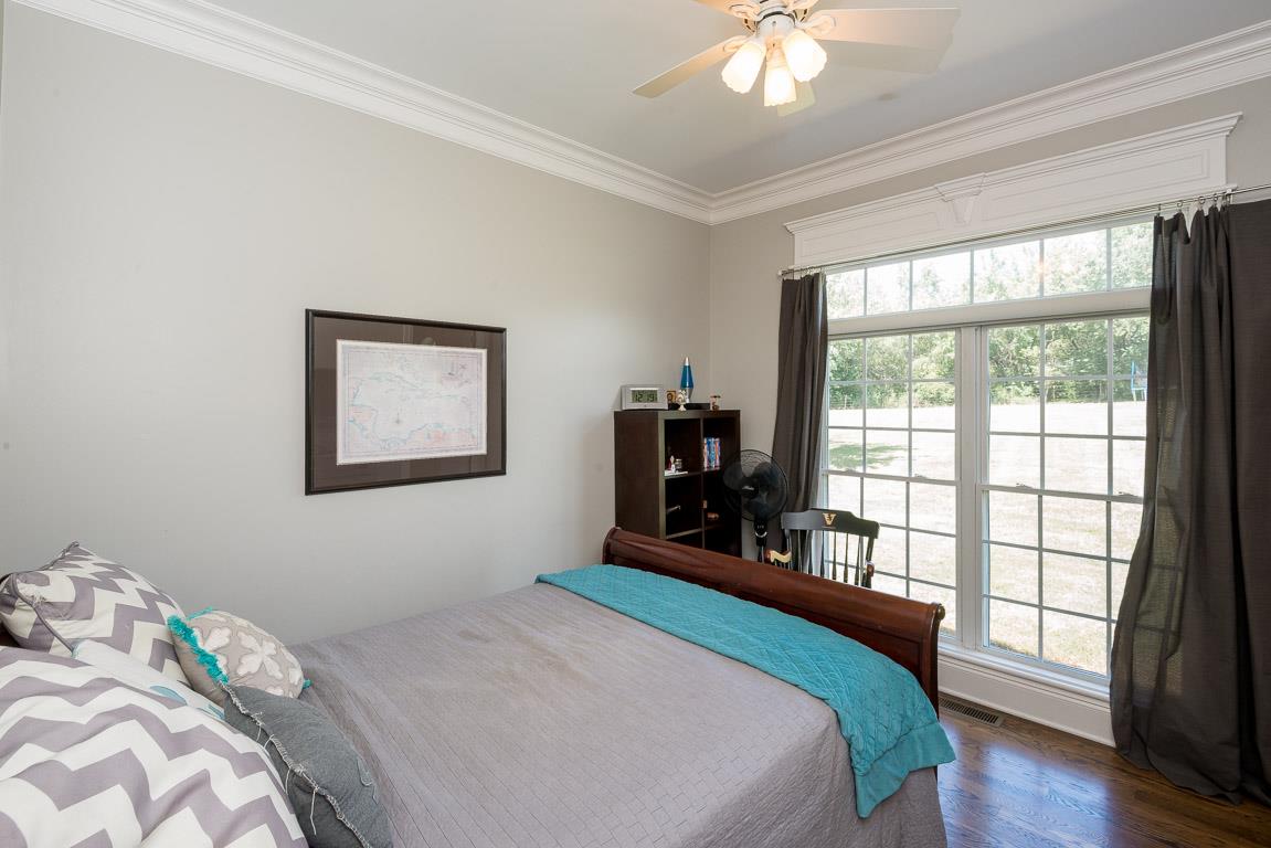 4248 Crowder Road Franklin, TN 37064 - Photo 24 of 29 a bedroom with a bed and a large window