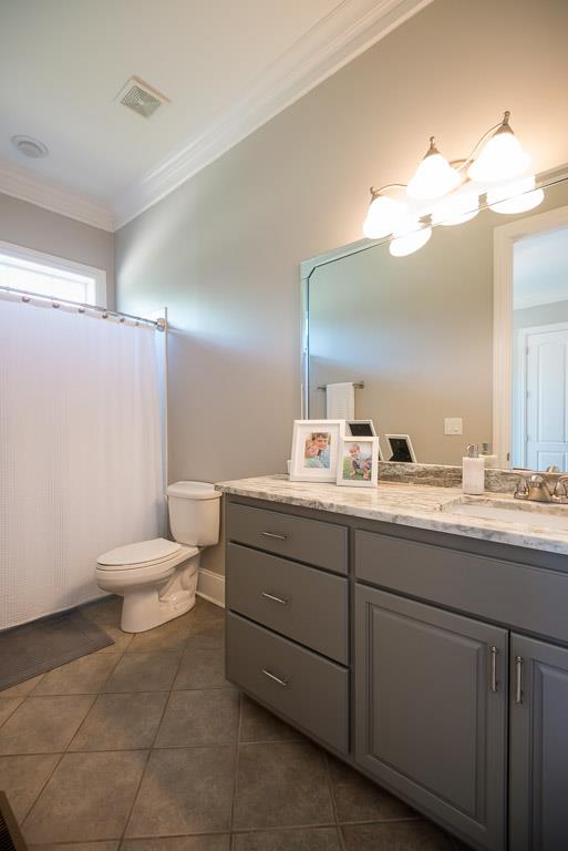 4248 Crowder Road Franklin, TN 37064 - Photo 27 of 29 a bathroom with a toilet sink and mirror