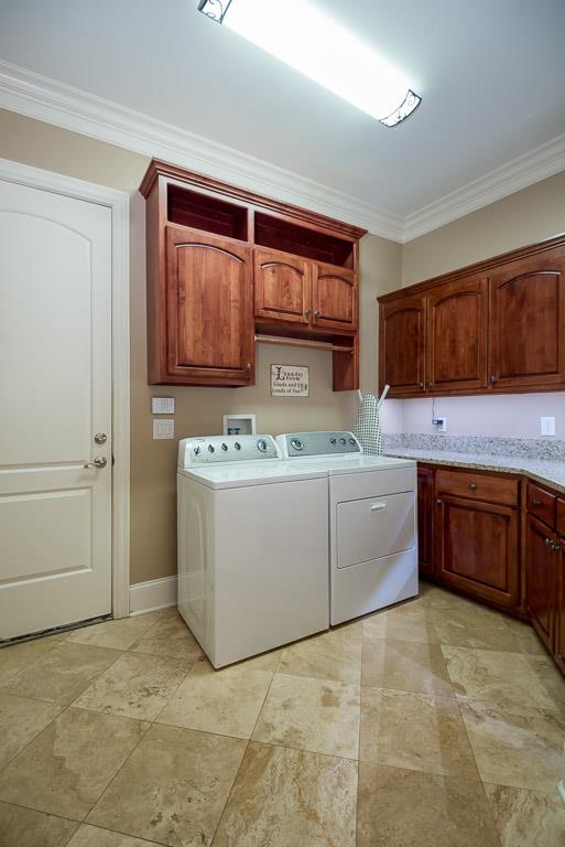 4248 Crowder Road Franklin, TN 37064 - Photo 28 of 29 a utility room with cabinets washer and dryer