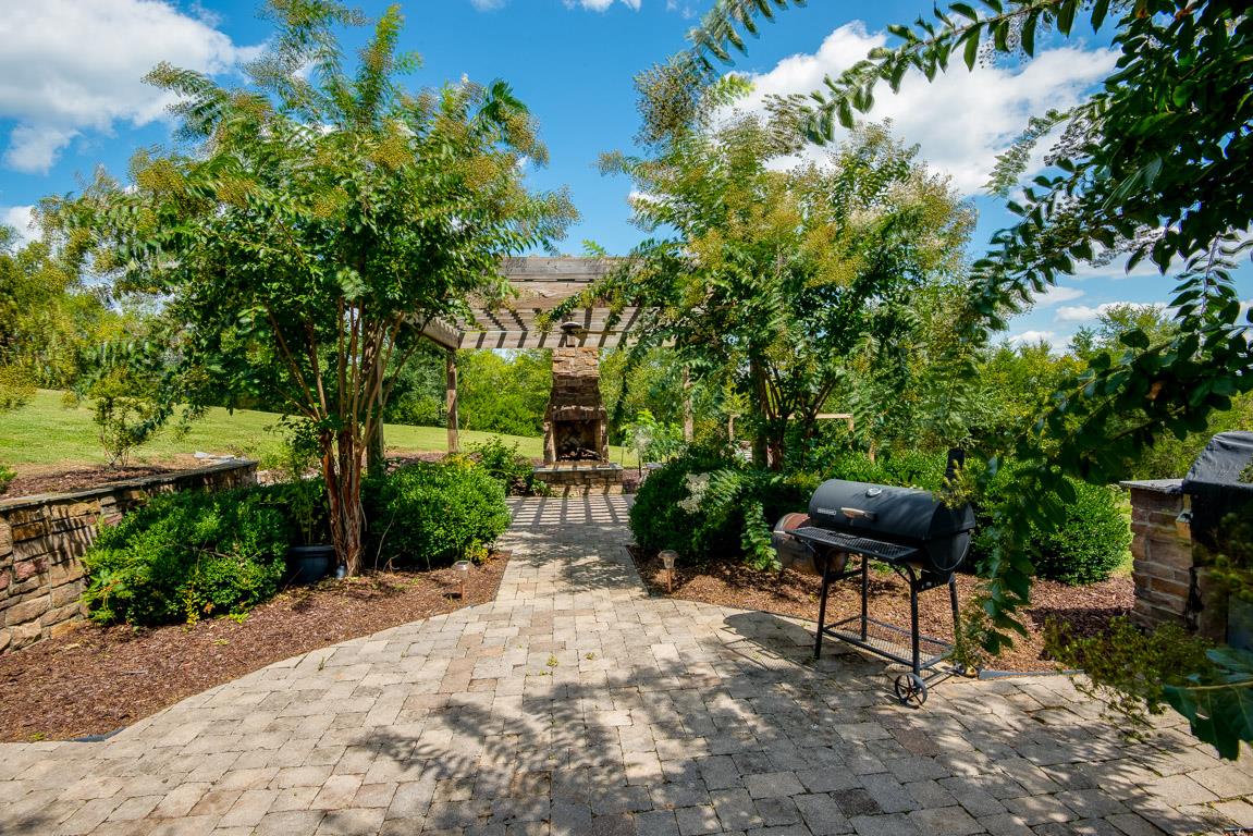 4248 Crowder Road Franklin, TN 37064 - Photo 8 of 29 a view of a backyard with sitting area
