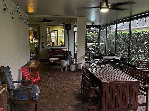 960 Seburn Road Apopka, FL 32703 - Photo 11 of 13 a bedroom with furniture and a window