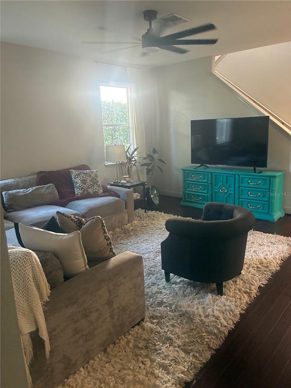 960 Seburn Road Apopka, FL 32703 - Photo 7 of 13 a living room with furniture and a flat screen tv