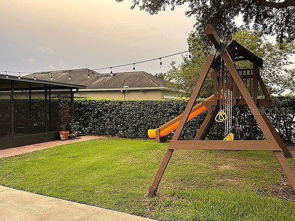 960 Seburn Road Apopka, FL 32703 - Photo 10 of 13 a view of a backyard with sitting area