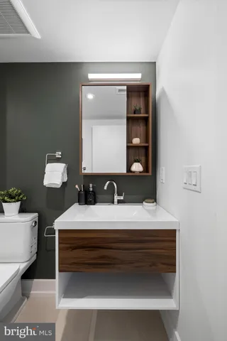a bathroom with a sink and a toilet