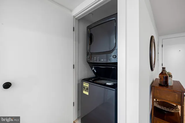 a kitchen with a refrigerator and a stove