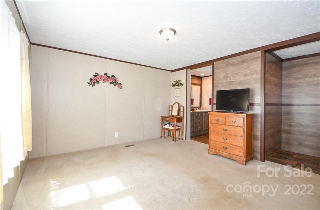 1816 Russell Pope Road Wingate, NC 28174 - Photo 16 of 23 a view of room with cabinet