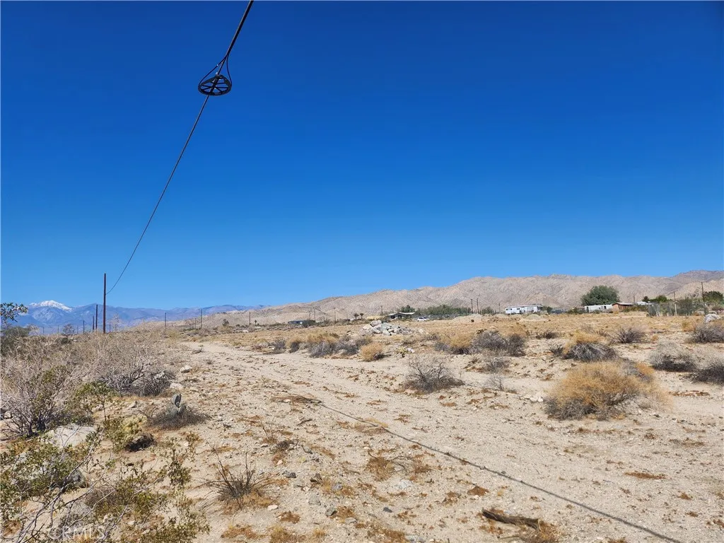 0 18th Desert Hot Springs Desert Hot Springs, CA 92241 - Photo 4 of 6 a view of a dry yard