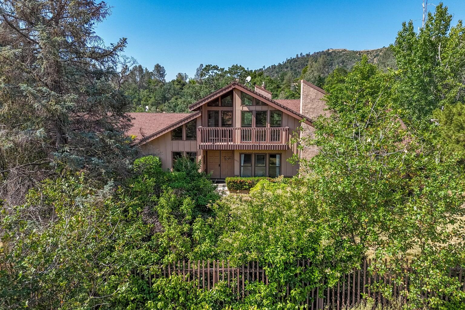8846 Goldstone Lane Redding, CA 96001 - Photo 60 of 64 a front view of a house with a yard