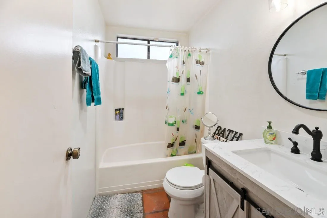 894 Coldstream Drive El Cajon, CA 92020 - Photo 19 of 30 a bathroom with a sink toilet and bathtub