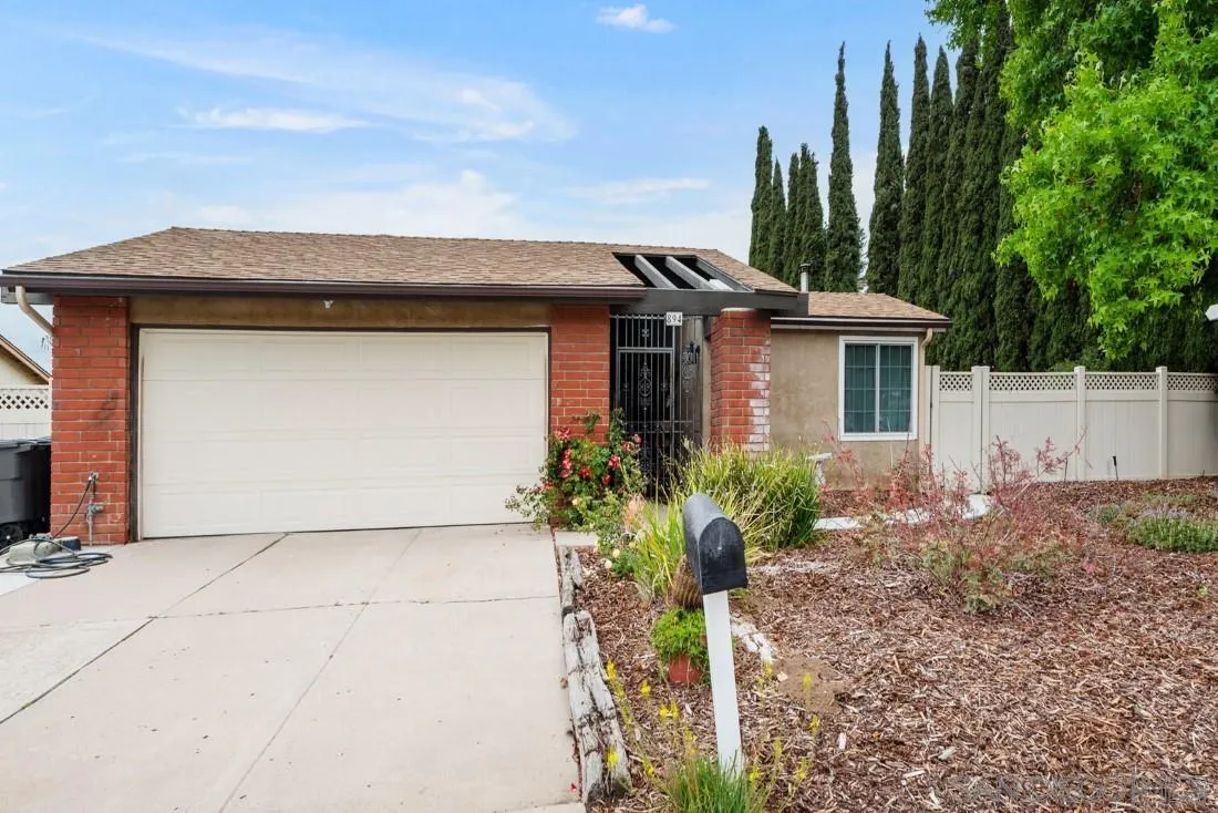 894 Coldstream Drive El Cajon, CA 92020 - Photo 2 of 30 a front view of a house with garden