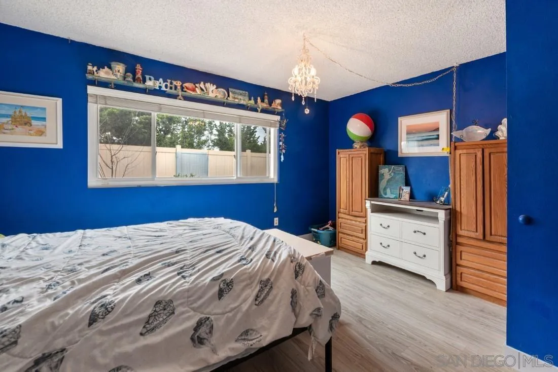 894 Coldstream Drive El Cajon, CA 92020 - Photo 22 of 30 a bed room with a bed and a window