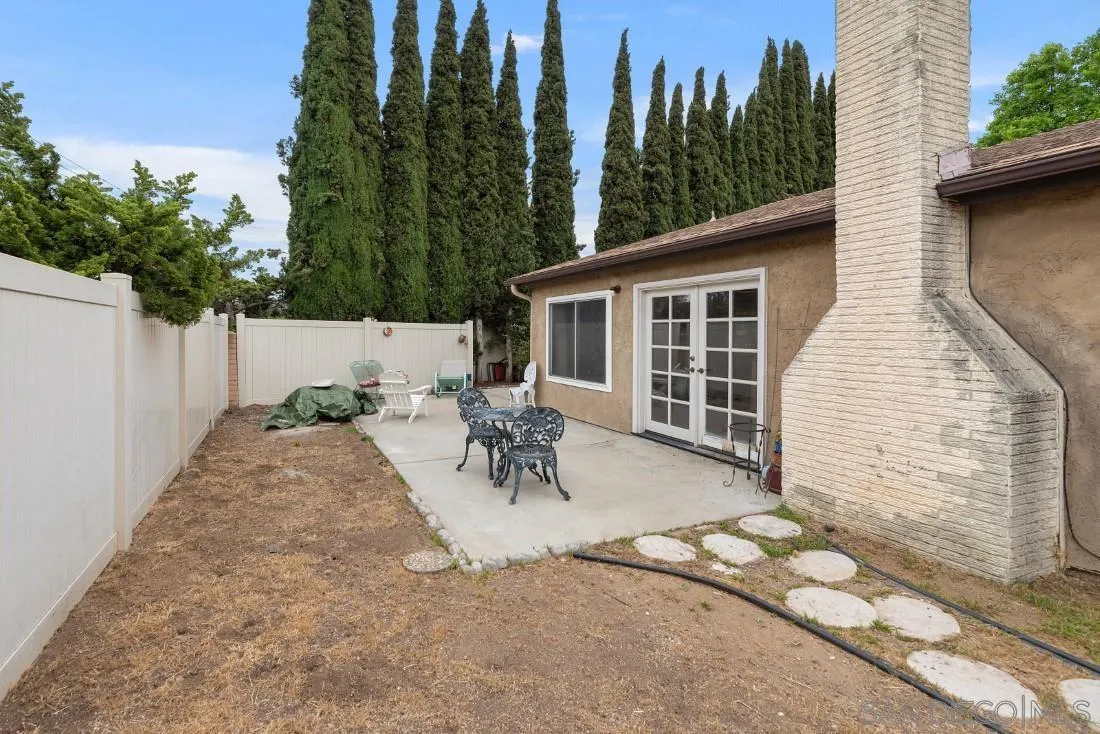 894 Coldstream Drive El Cajon, CA 92020 - Photo 30 of 30 a view of a backyard with sitting area and tree
