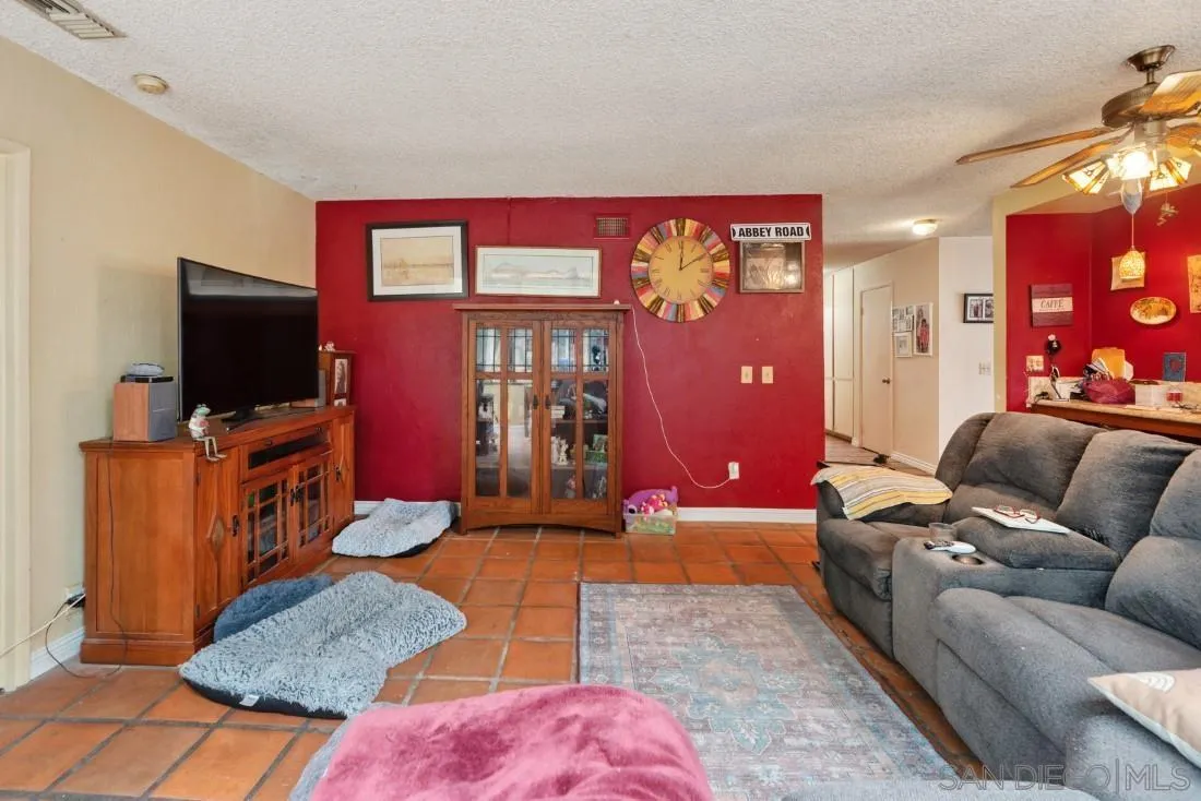 894 Coldstream Drive El Cajon, CA 92020 - Photo 10 of 30 a living room with furniture and a flat screen tv