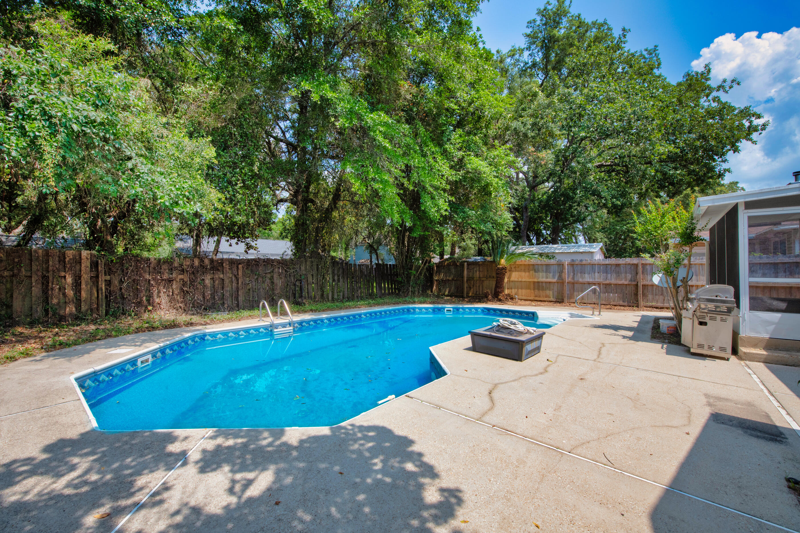 120 Wright Circle Niceville, FL 32578 - Photo 18 of 19 a view of a backyard with swimming pool