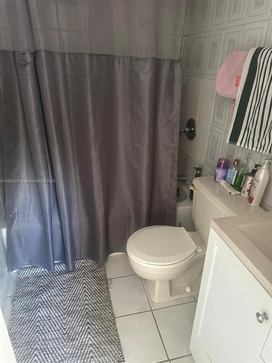 8000 Southwest 152nd Avenue, Unit 115 Miami, FL 33193 - Photo 24 of 33 a bathroom with a sink and a toilet