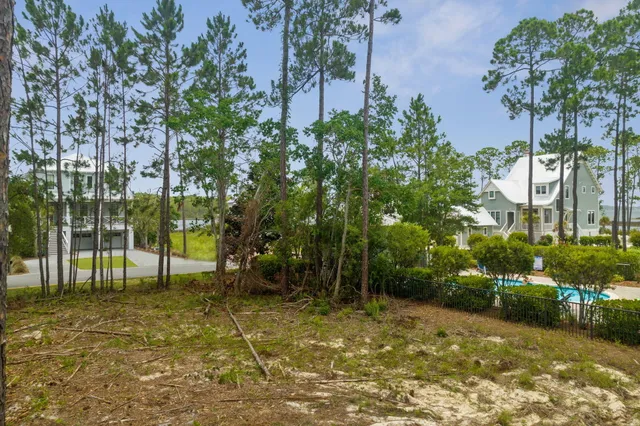 swimming pool view with a seating space
