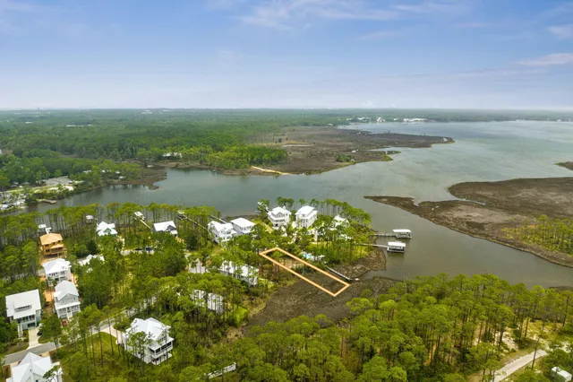 a view of an ocean and a yard