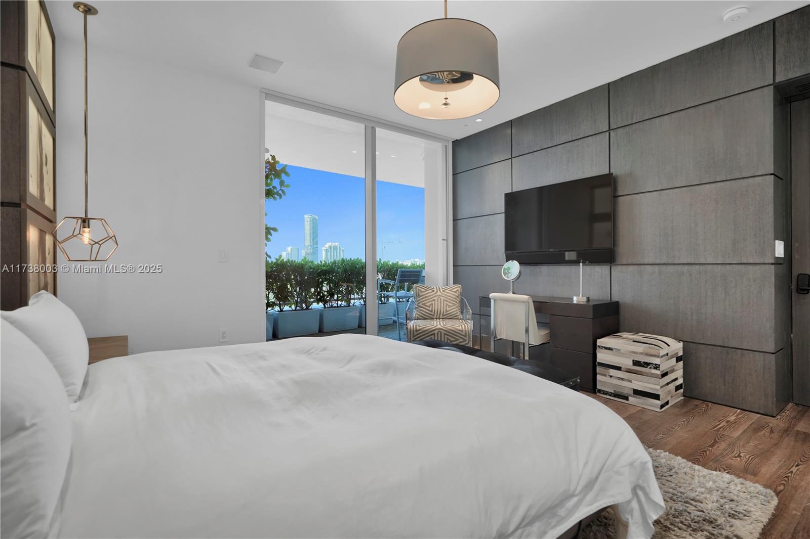 125 Ocean Drive, Unit PH Miami Beach, FL 33139 - Photo 19 of 56 a bedroom with bed tv and a mirror
