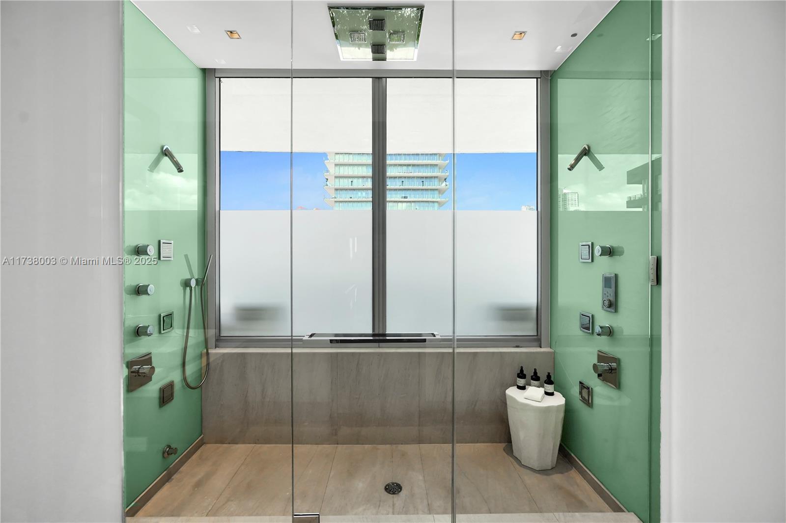 125 Ocean Drive, Unit PH Miami Beach, FL 33139 - Photo 33 of 56 a bathroom with a bathtub and a shower