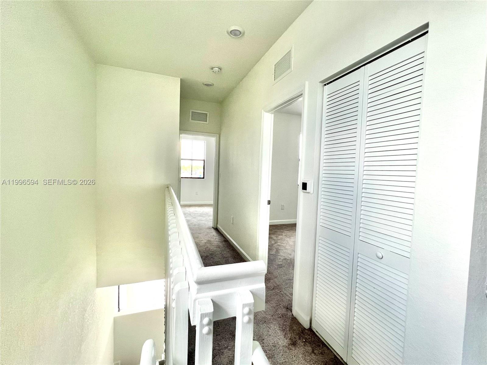 23373 Southwest 129th Path, Unit 23373 Homestead, FL 33032 - Photo 13 of 18 a bathroom with a sink and a mirror