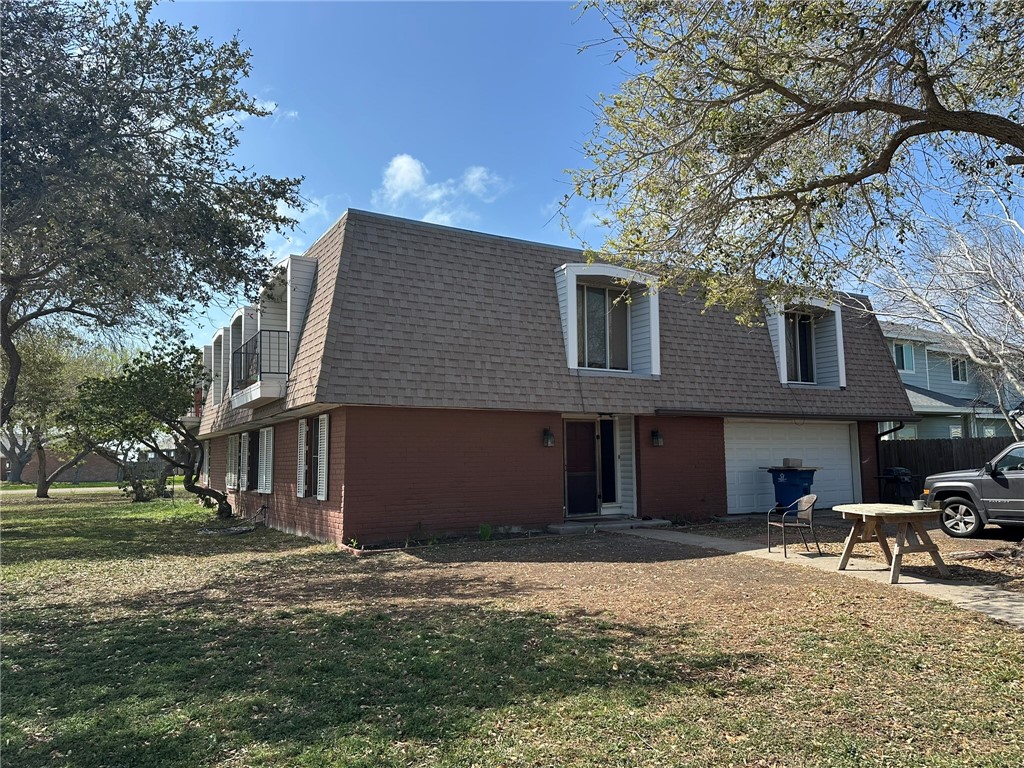 310 Sunset Boulevard Portland, TX 78374 - Photo 18 of 18 a house that has a tree in front of it