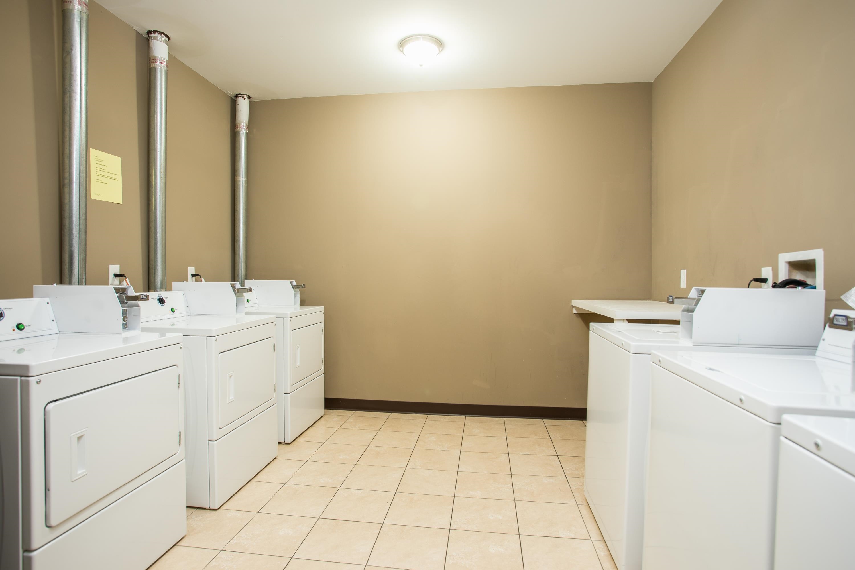 6111 Fillmore Place, Unit 306 West New York, NJ 07093 - Photo 3 of 27 a utility room with dryer and washer