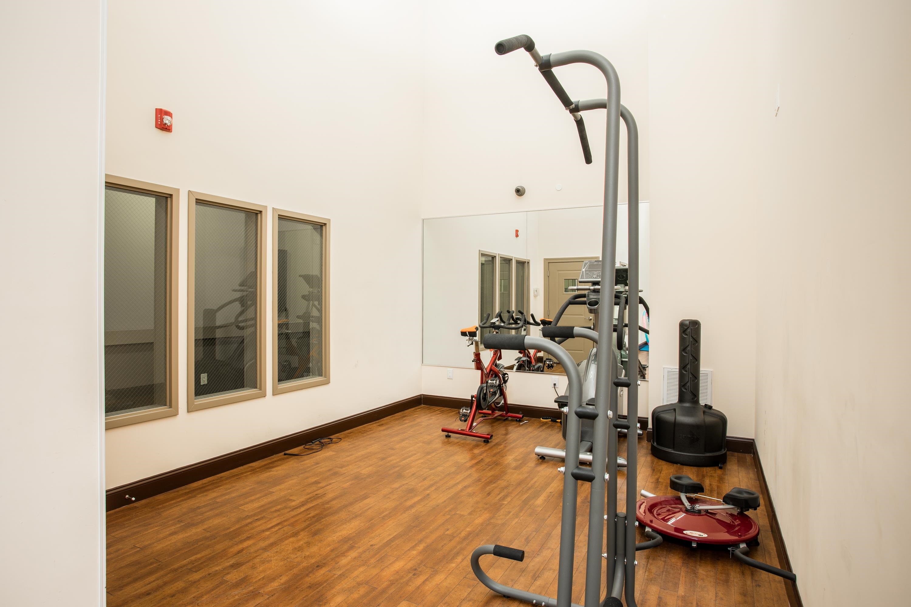 6111 Fillmore Place, Unit 306 West New York, NJ 07093 - Photo 5 of 27 a view of a room with gym equipment