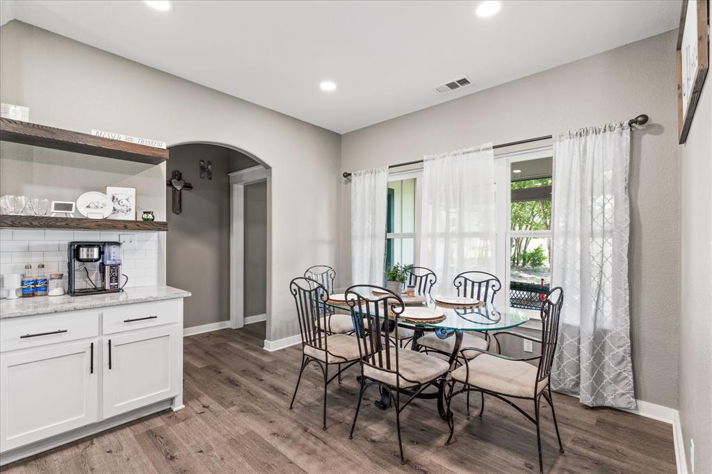 710 Valek Road Ennis, TX 75119 - Photo 18 of 40 a dining room with furniture and window