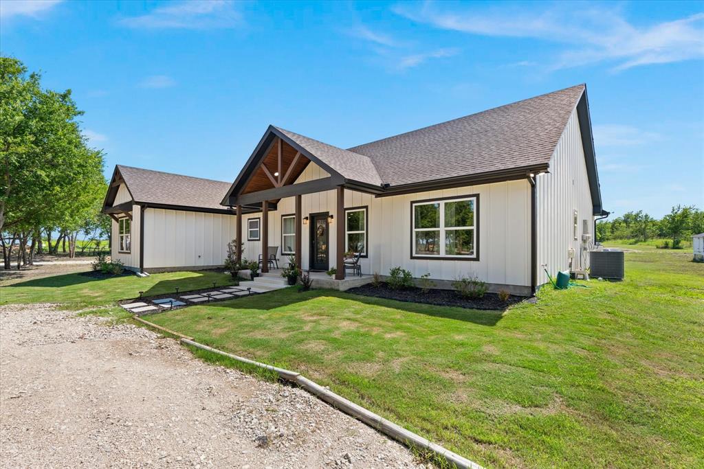 710 Valek Road Ennis, TX 75119 - Photo 7 of 40 a view of a house with a patio