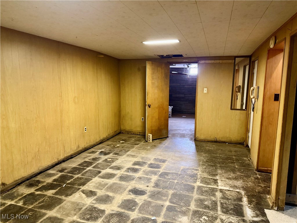 923 Archer Hill Road Colliers, WV 26035 - Photo 22 of 33 Finished below grade area featuring wooden walls and brick patterned flooring