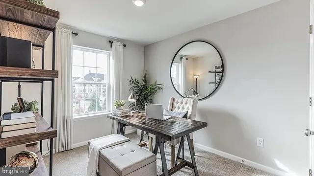 a view of a livingroom with furniture