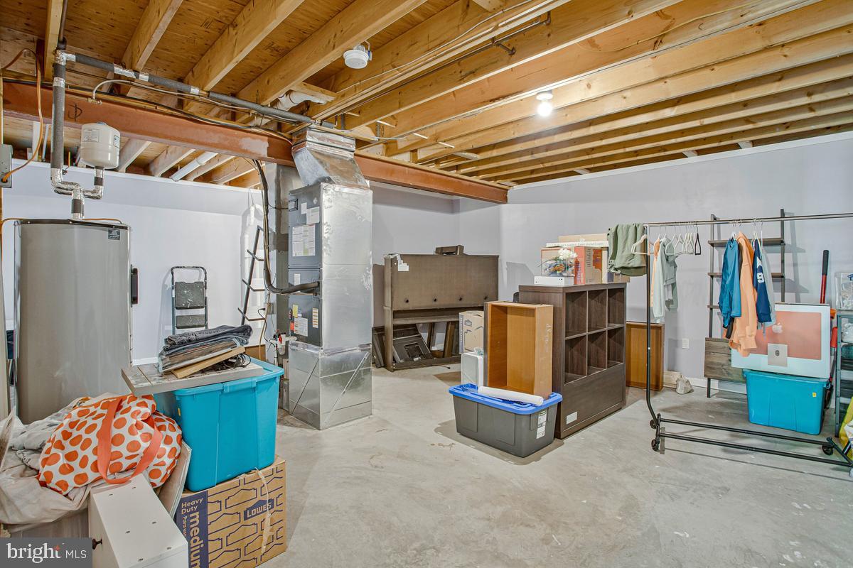 6098 Fir Road St. Leonard, MD 20685 - Photo 23 of 25 Spacious unfinished basement ready for ideas.