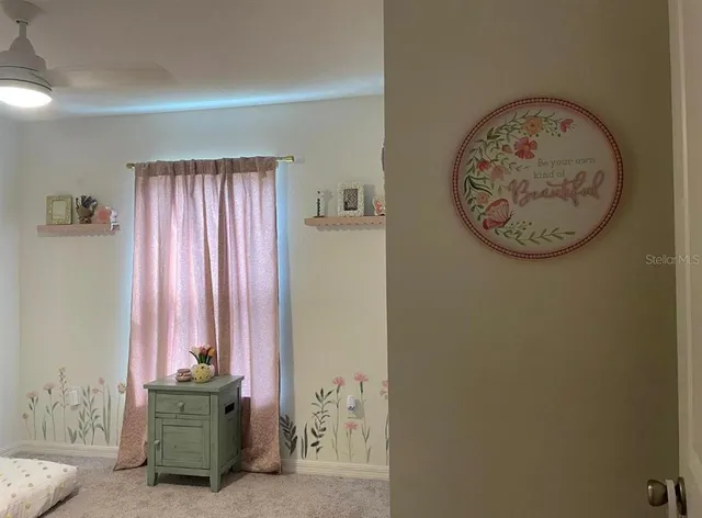 a view of a hallway with entryway door