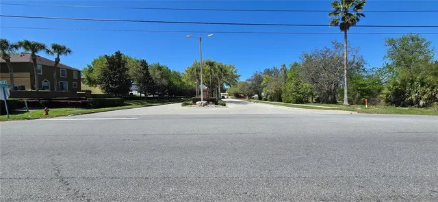 a view of a house with a street
