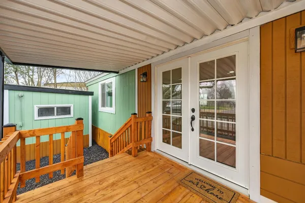 a view of a house with a wooden door