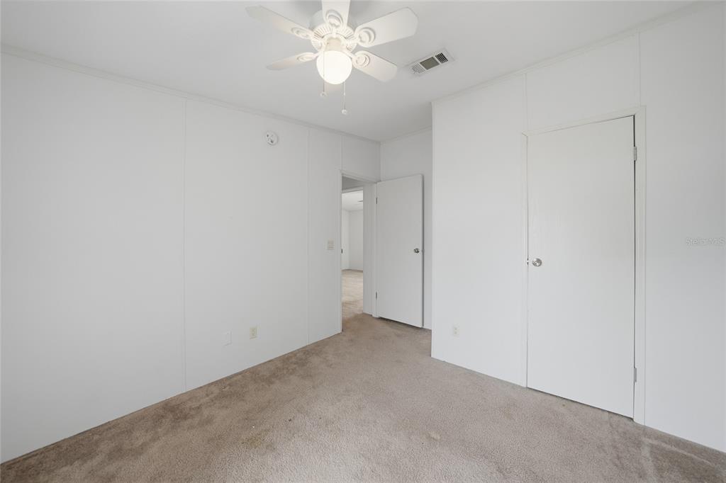 11923 Southwest Loop Terrace Arcadia, FL 34269 - Photo 28 of 50 a view of an empty room with a fan