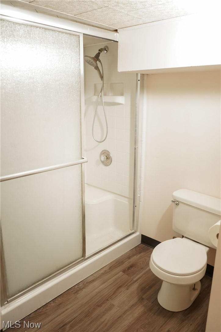 326 Pangborn Road Leavittsburg, OH 44430 - Photo 13 of 25 Bathroom featuring dark hardwood flooring, vanity, and mirror