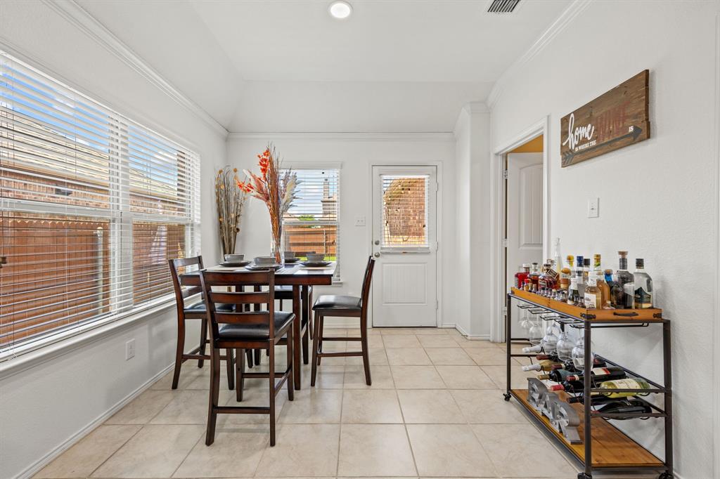 3010 Rosemount Lane Forney, TX 75126 - Photo 12 of 33 a view of a dining room with furniture and a window