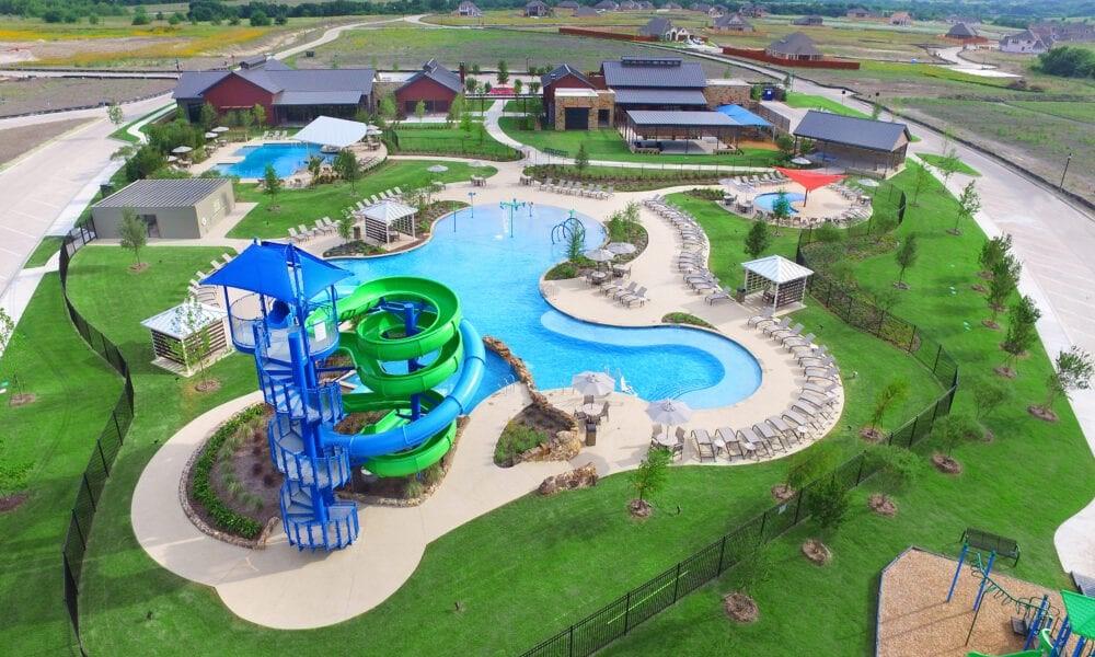 3010 Rosemount Lane Forney, TX 75126 - Photo 27 of 33 a view of a swimming pool in he middle of the green field