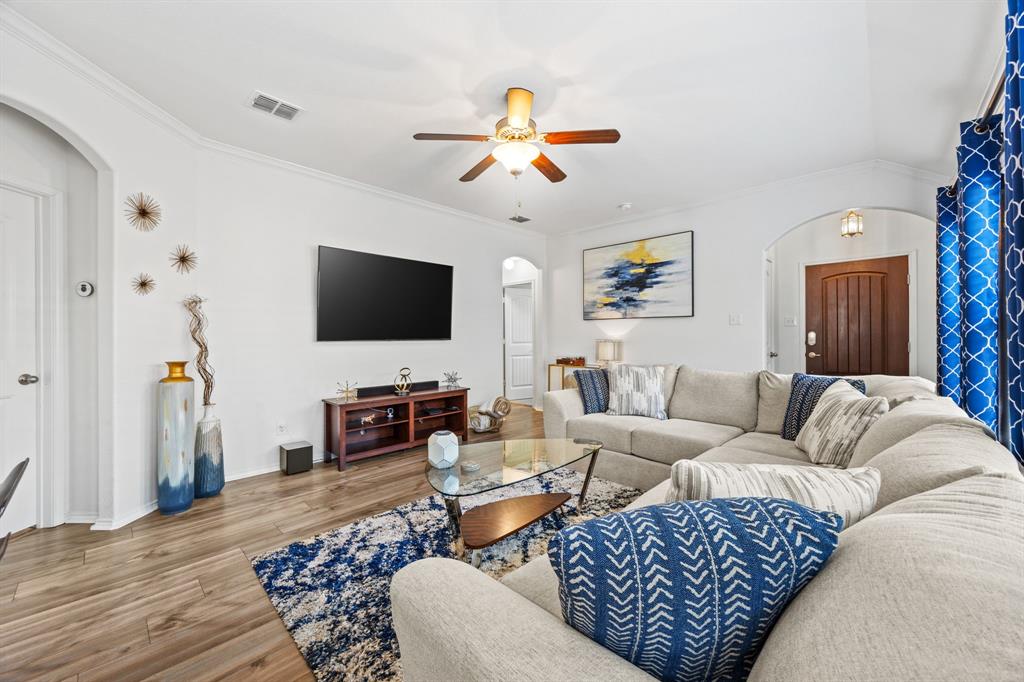 3010 Rosemount Lane Forney, TX 75126 - Photo 6 of 33 a living room with furniture and a flat screen tv
