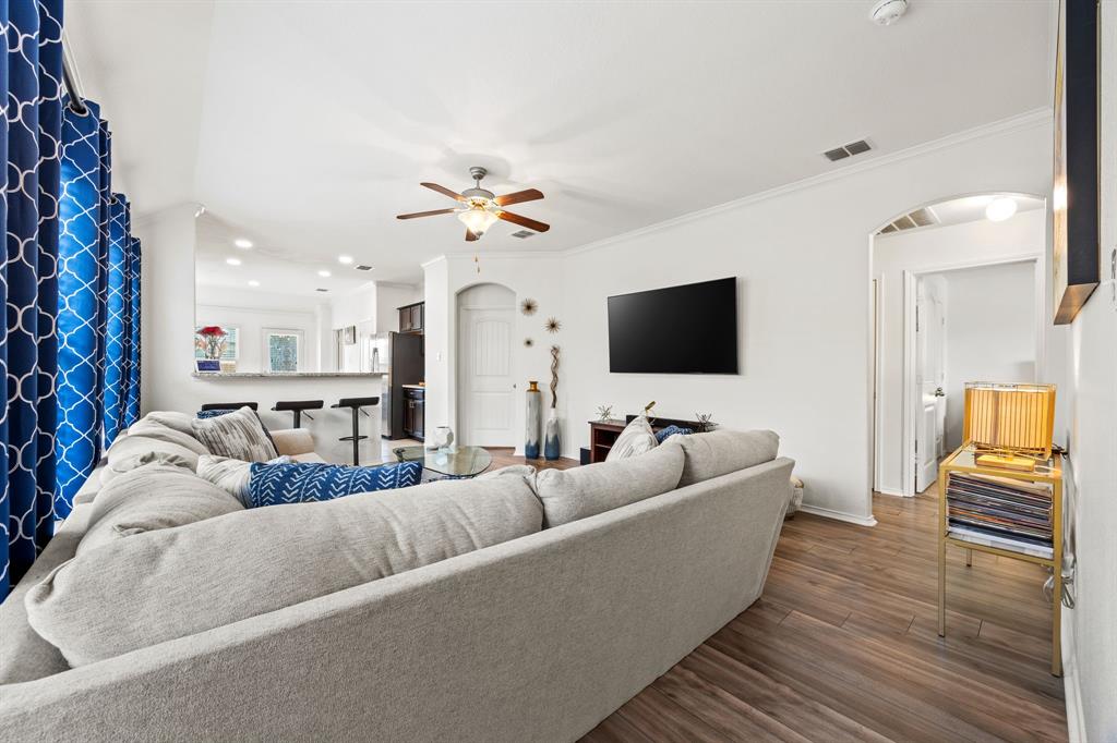 3010 Rosemount Lane Forney, TX 75126 - Photo 7 of 33 a living room with furniture and a flat screen tv