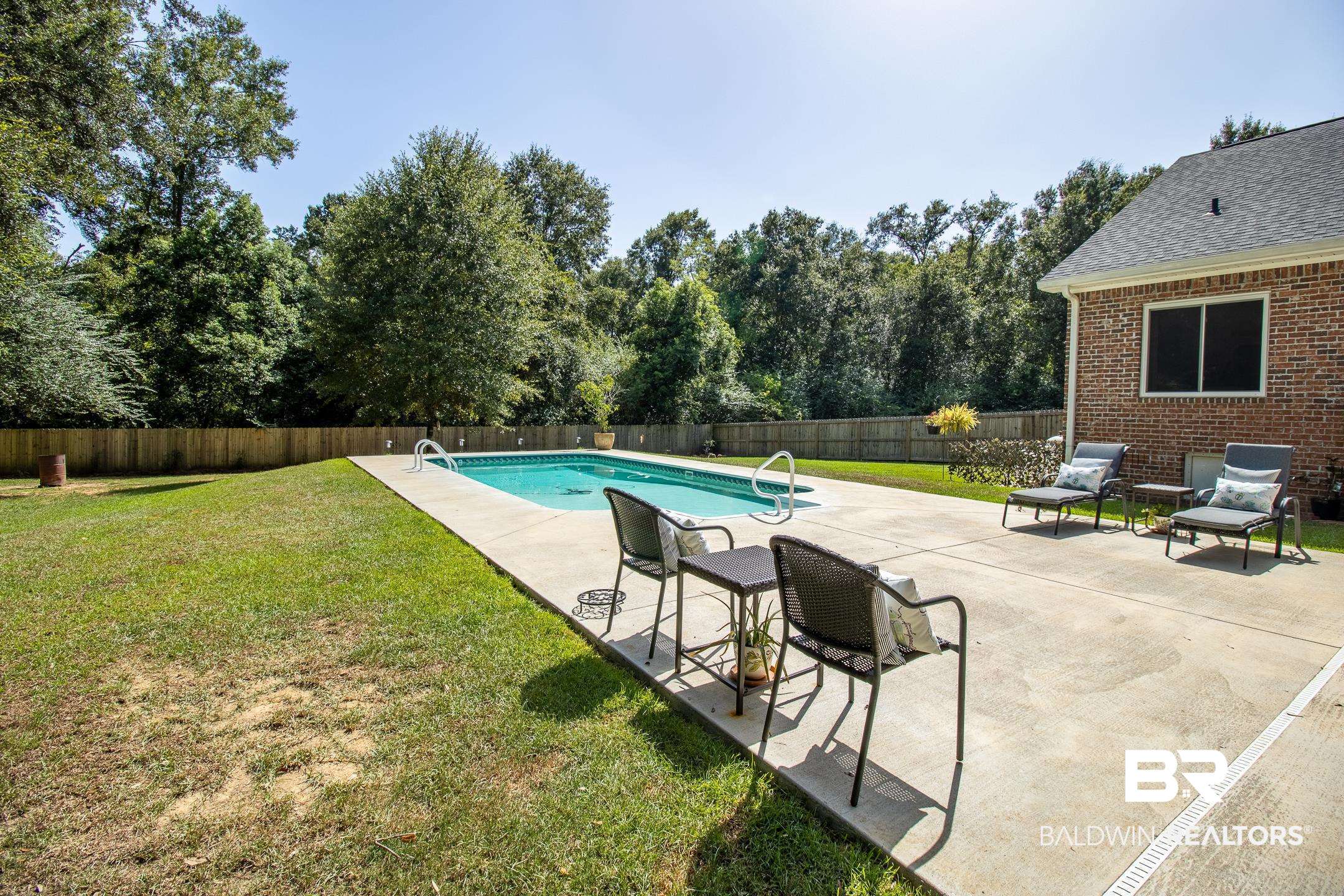 22424 Ard Road Robertsdale, AL 36567 - Photo 26 of 33 Concrete Patio Surround