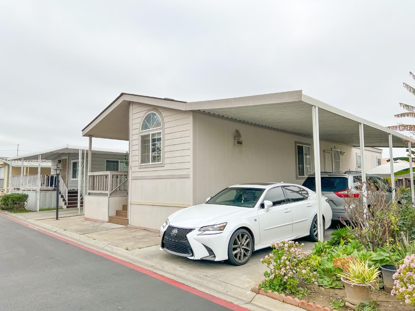 a car parked in front of a house