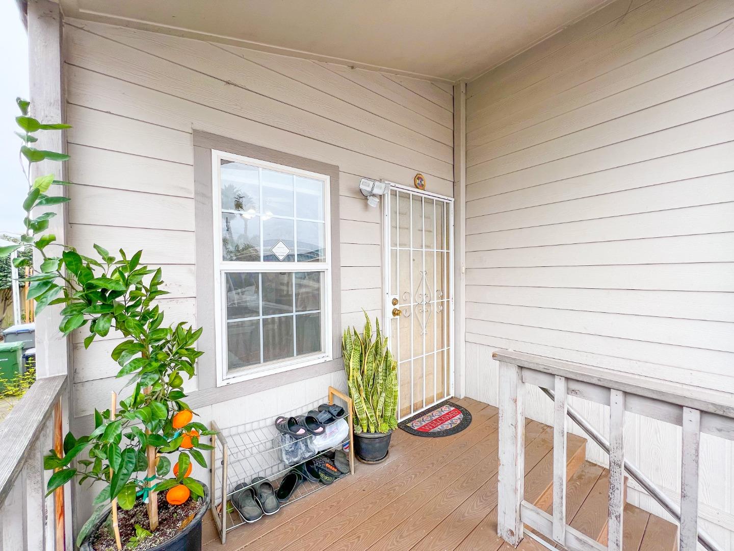 555 Umbarger Road, Unit 30 San Jose, CA 95111 - Photo 14 of 15 a vase of flowers sitting on a floor
